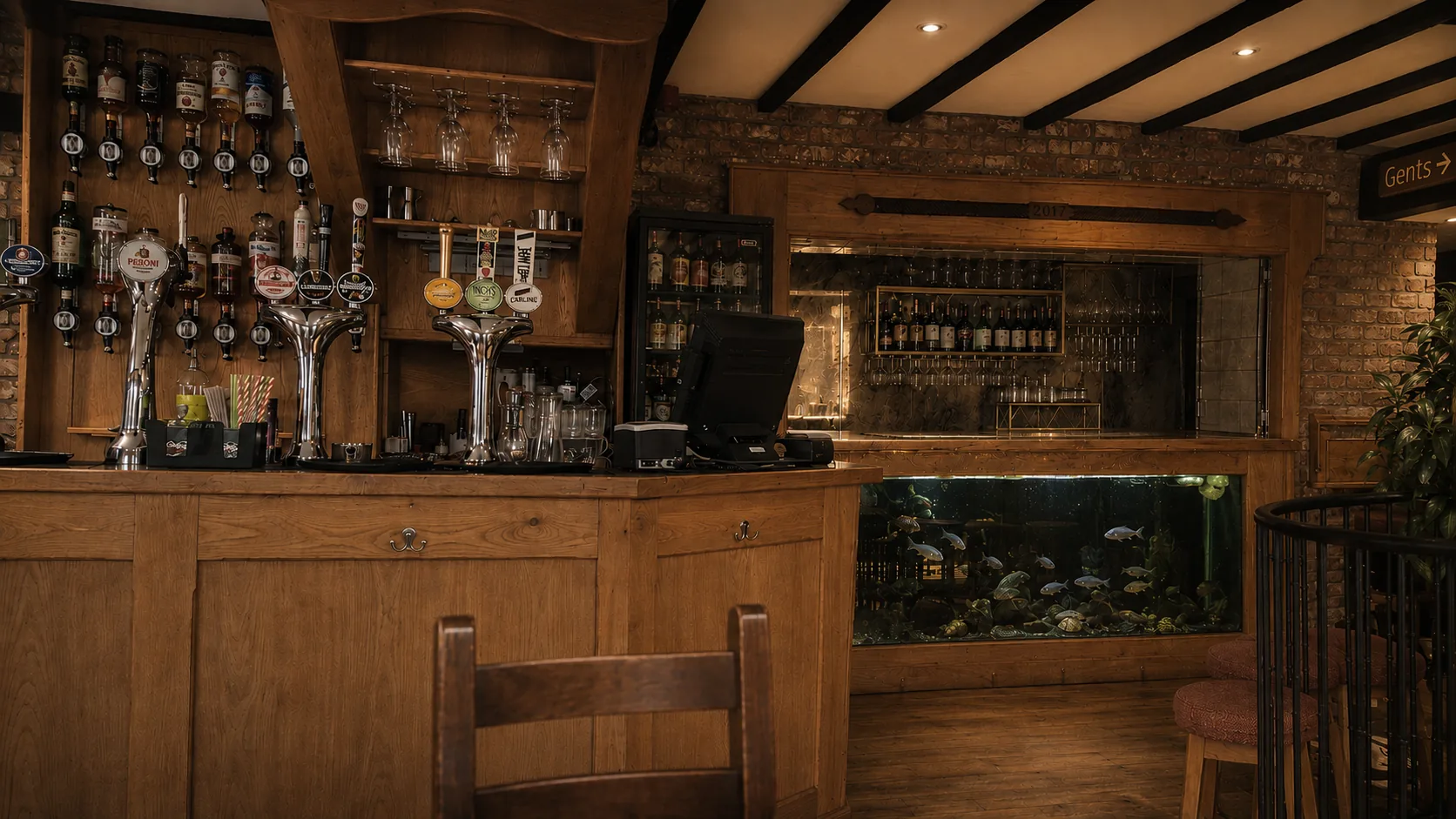 Warm wooden bar and drinks at Middle Earth Tavern