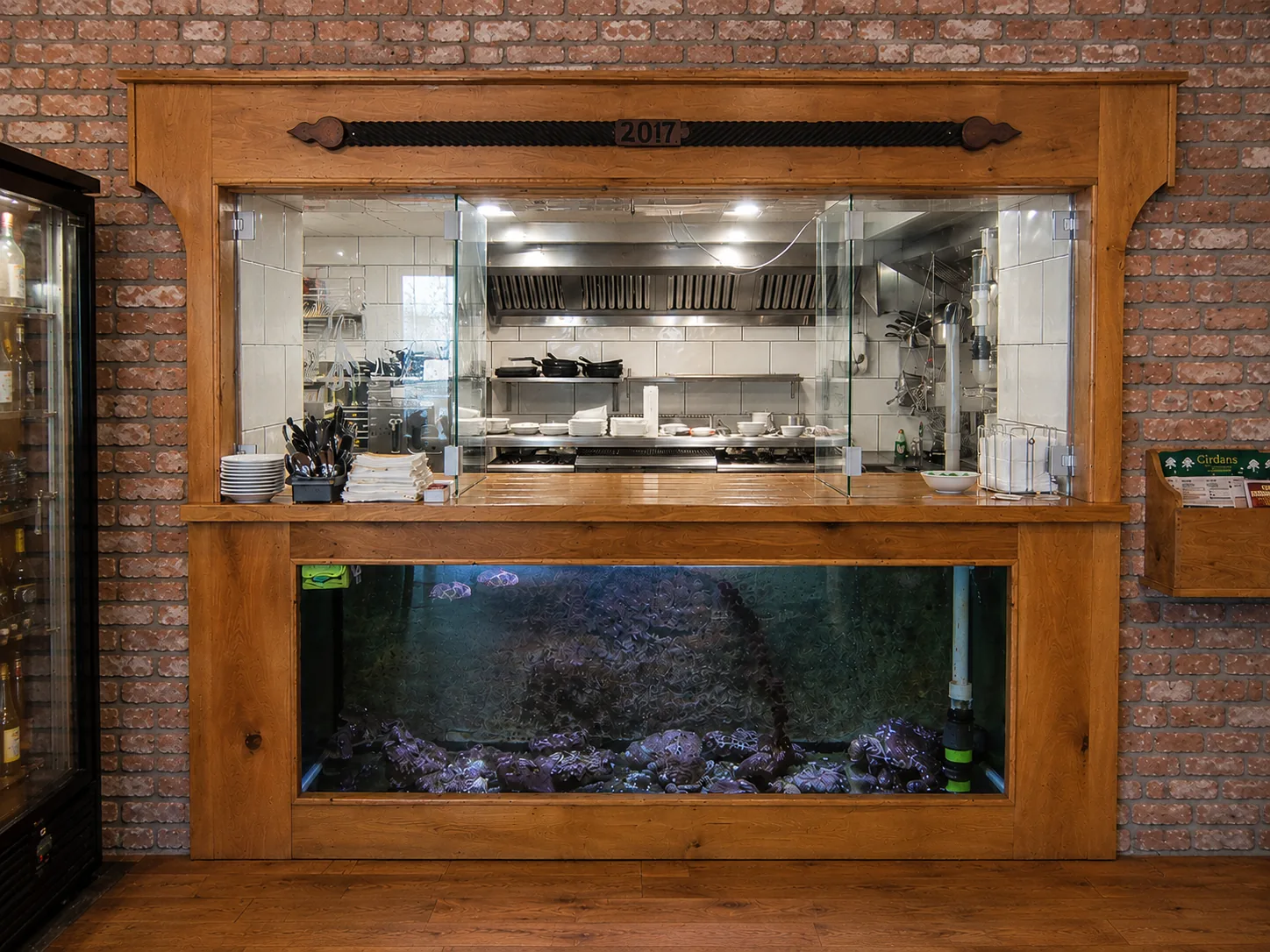 Open kitchen window and aquarium feature